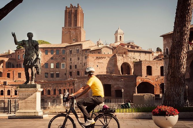 Rome in a Day Cannondale E-Bike Tour with Typical Italian Lunch - Trevi Fountain and the coin story: quick stop, big payoff