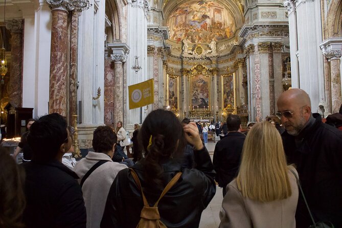 Rome Jubilee Walking Tour of Churches, Bridges & Legends - Via dei Coronari: pilgrims’ street, mixed morals and big imagination