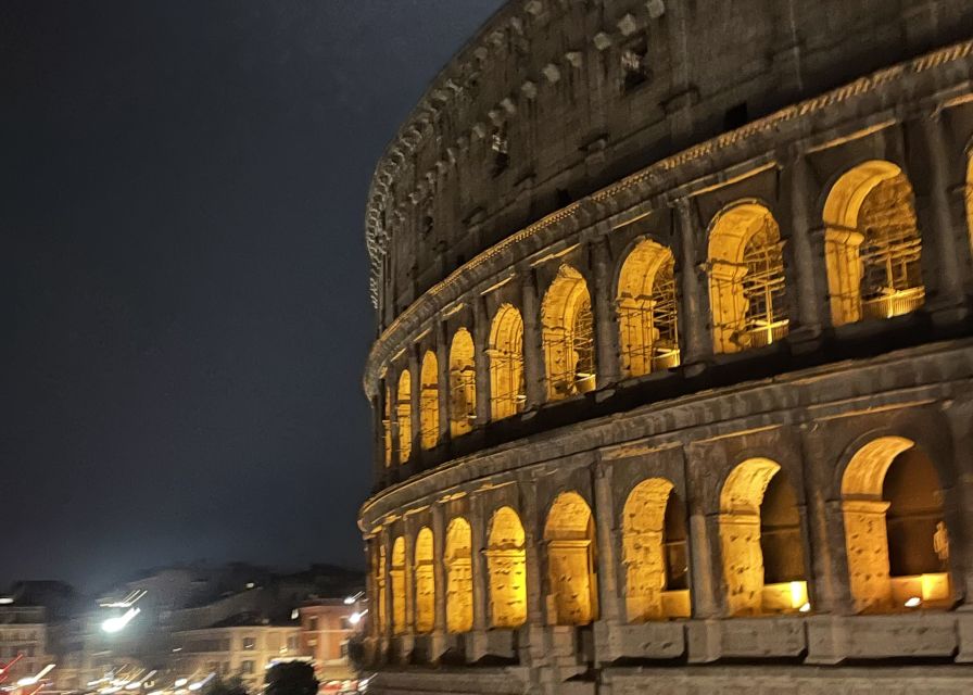 Rome: Nighttime Tour Outside the Colosseum with Local Guide - Meeting at Vittorio Emanuele II: Look for the Black Umbrella