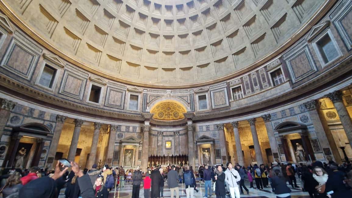 Rome: Pantheon Guided Tour with Reserved Entry Ticket - Inside the Pantheon: columns, bronze doors, and the big moment of looking up