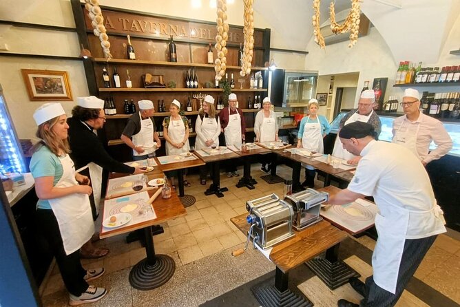Rome: Pasta Cooking Class, Dinner & Wine in Authentic Restaurant - Wine, dinner-sized portions, and the ricotta and visciole finale