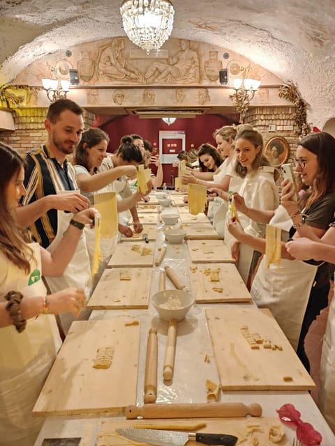 Rome: Pasta & Tiramisu Cooking Class near the Spanish Steps - Trattoria Amici and the old painted walls that make the night feel different