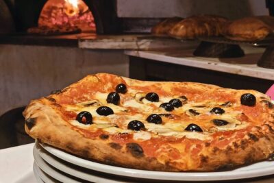 Rome: Pizza Cooking Class combined with Guided Sightseeing - Piazza Navona walking tour: baroque landmarks after the oven