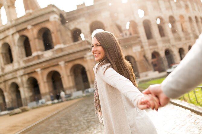Rome: Private Photo Shoot at The Colosseum - Via dei Fori Imperiali vibe: pine-lined walking photos that breathe