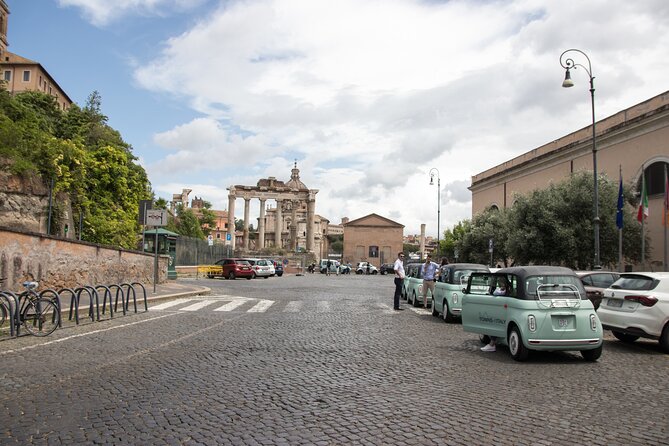 Rome: Self-Guided Tour of the City in a Fiat Topolino E-Car - The fountain designed by Giovanni Fontana: white marble and a five-arch gateway