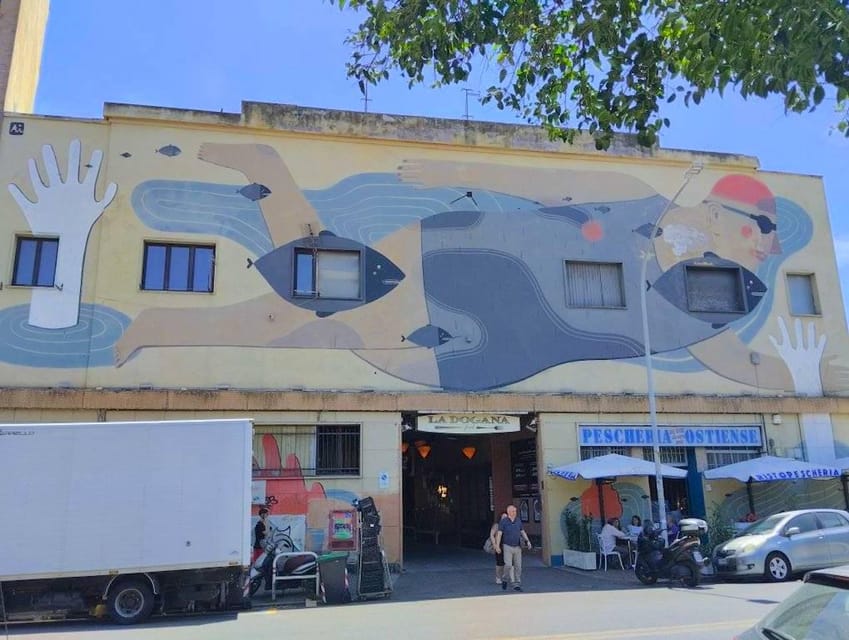 Rome street art tour: off the beaten path with a local guide - Garbatella Murals: Where Architecture Meets Public Art