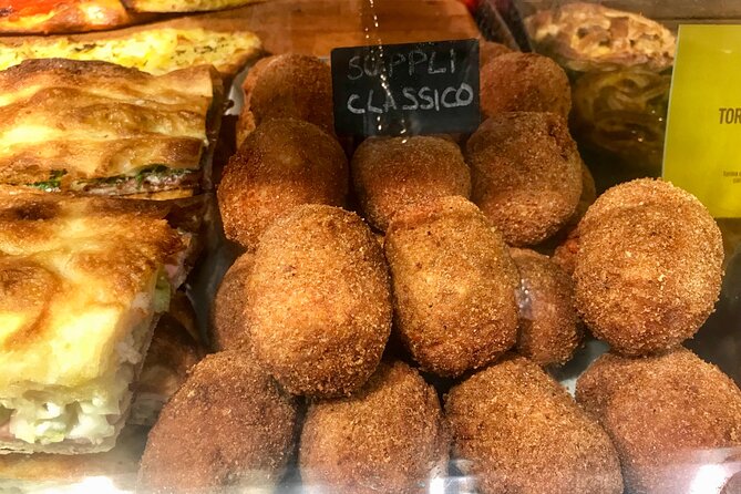 Rome Street Food Tour with Local Guide - What you actually eat: suppli, pizza, pastries, and Roman staples