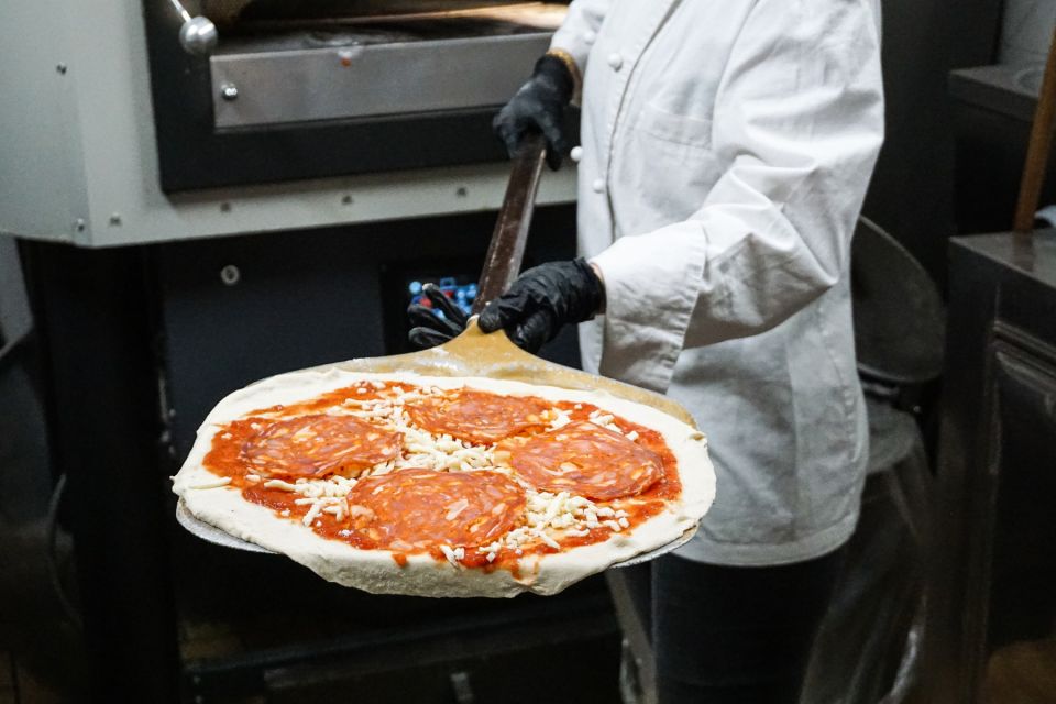 Rome: Traditional Pizza Cooking Class near Piazza Navona - What you do during the pizza class: dough, stretching, toppings, and baking