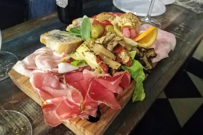 Rome: Trastevere Food Tour Wine Tasting and Local Expert Guide - Stop 2: Tiber Island Area Stops (Riverside Sights Between Tastings)
