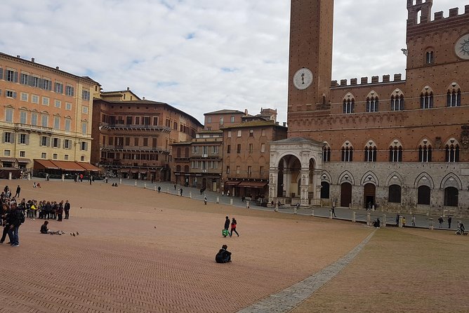 Siena and San Gimignano from Rome: Wine Tasting Tour in Tuscany - San Gimignano: Towers, Vernaccia, and a Medieval Fairytale Mood