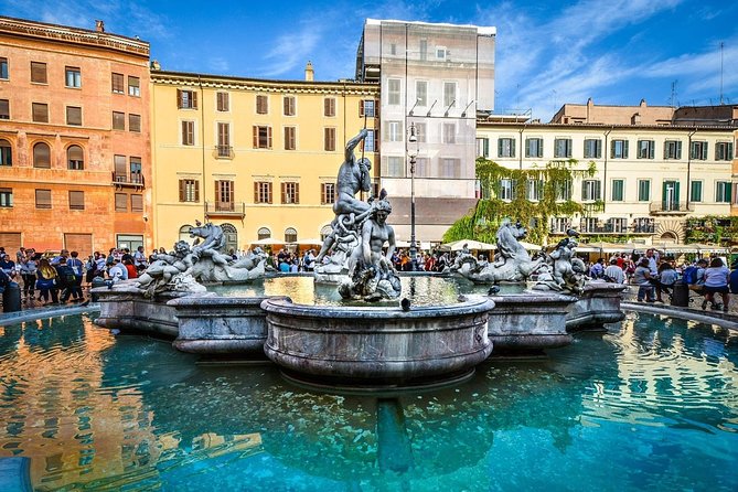Sightseeing Walking Tour of Rome By Night: Trevi Fountain & Other Highlights - Piazza Navona at night: stadium ruins, Bernini fountains, and photo time