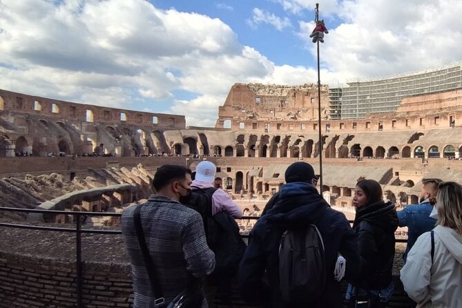 Small group Colosseum with Arena Floor, Palatine Hill & Forum Tour - The guide and headphones make the ticket feel worth it