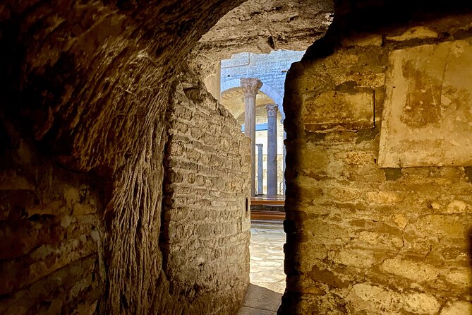 Small-Group Tour of Roman Catacombs & St. Clement's Undergrounds - The 4th-century basilica walls and fresco scenes