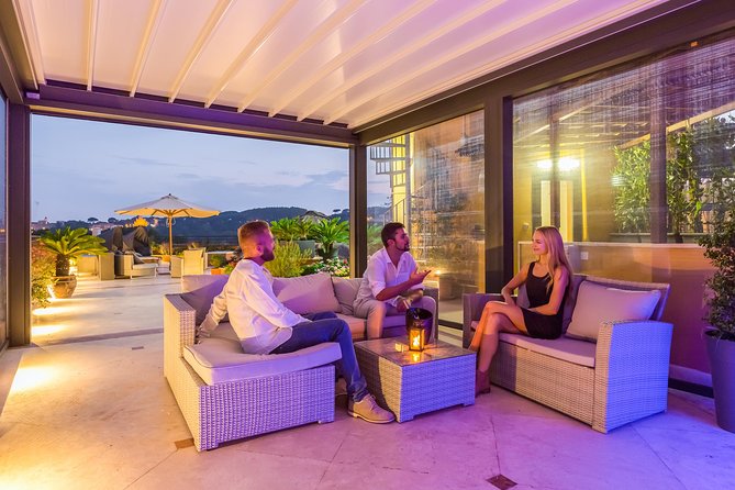 Sunset drinks on the rooftops of Rome - Covered and heated seating for cool or unsettled evenings