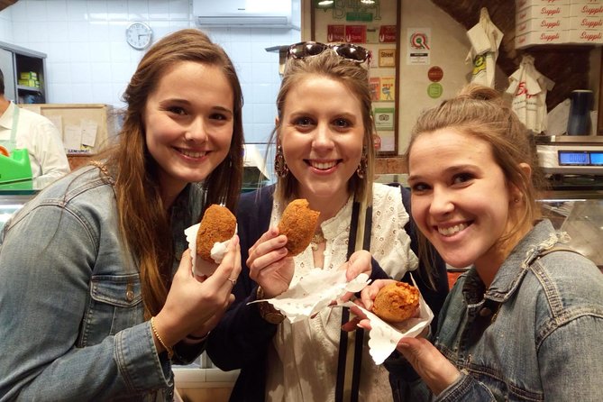Tasty Trastevere Street Food Tour in Rome from Tiberine Island to Ponte Sisto - Piazza Trilussa: Pizza, Parmigiano, Prosciutto, and the 1940 Bakery
