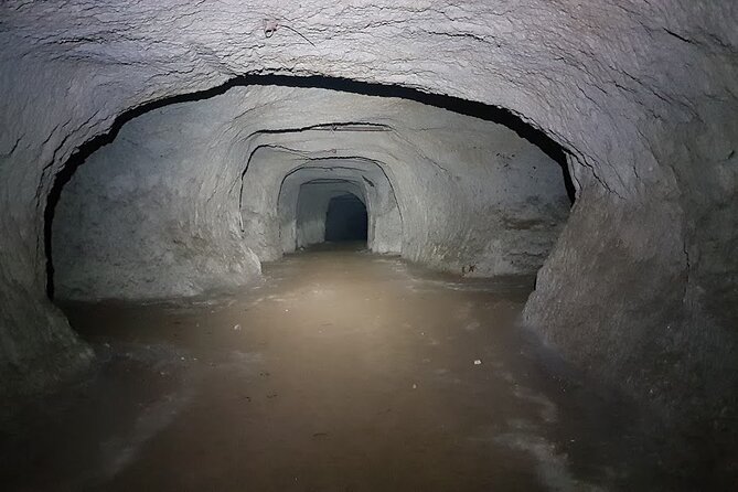 The Labyrinth of Rome between catacombs and ancient quarries - Catacombs and early Christians: walking into the dark on purpose