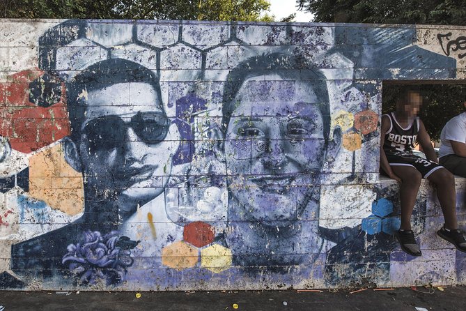 Torpignattara Photo Tour: melting pot, street art and politics - Starting at P.za Roberto Malatesta and ending at Arco di Travertino (line A)