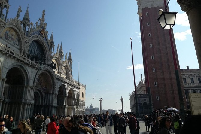Venice by Train from Rome: Enjoy a Private Day Tour Experience - Piazza San Marco: the square you can’t avoid, plus a real-world flooding twist