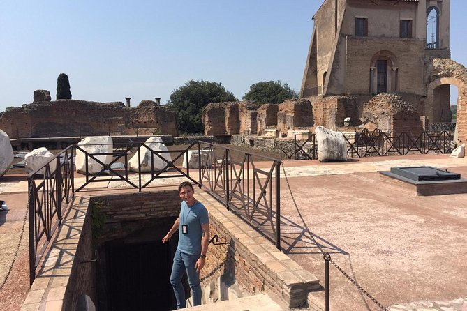 VIP Tour of the Colosseum, Forum & Palatine Hill by PhD Guide - Roman Forum Ruins: Senate House, Caesar, and Arches